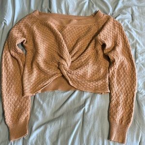 Sweater with twist/ knot on front